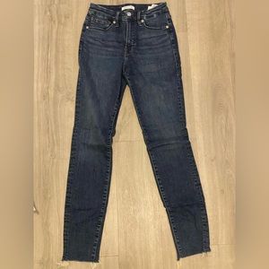 Good American dark wash skinny jeans.